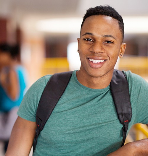 Young male student smiling